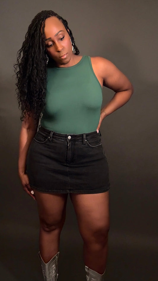 Front view of the Boat Neck Sleeveless Bodysuit in dark green paired with faded black denim jean skort Essential Basic Everyday Skort for a cute summer look.