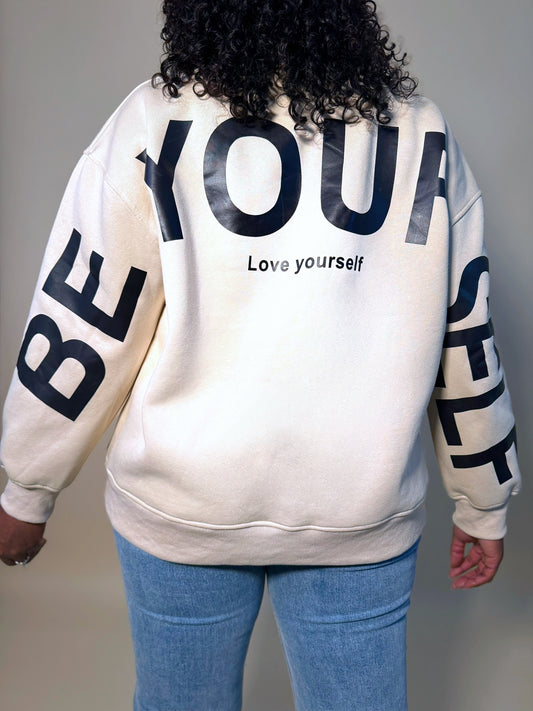 Front view of Women's Elevated Casual 'Be Yourself' oversized sweatshirt, featuring a bold graphic print, relaxed fit, and soft, cozy fabric for casual comfort.