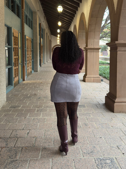 Front view of Women's Elevated Casual faux gray suede mini skirt with slit, showcasing a stylish and modern design perfect for elevated casual outfits.