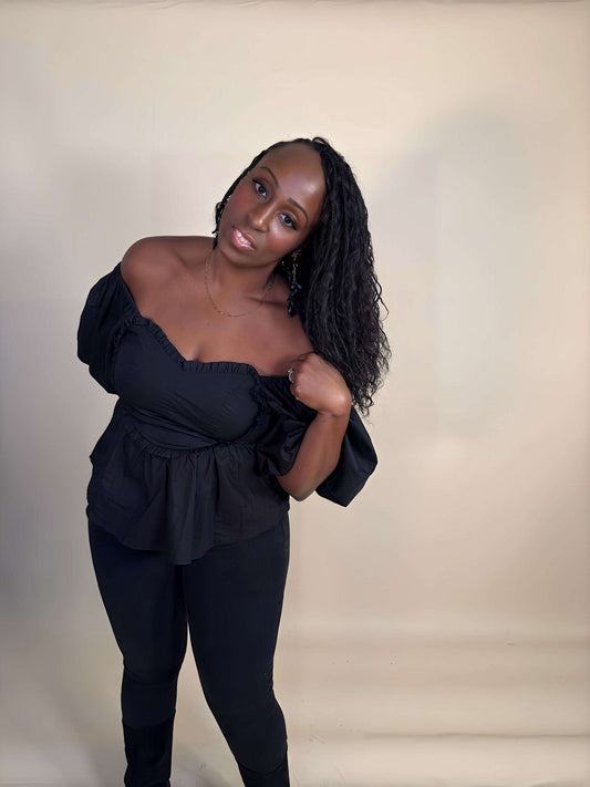 Front view of a black women's Sweetheart off the shoulder Puff Sleeve Peplum Top showcasing a flattering sweetheart neckline, elegant puff sleeves, and a figure-enhancing peplum silhouette for a chic, sexy, feminine look.